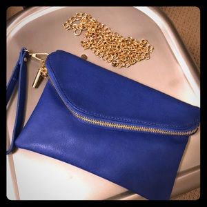Blue clutch with chain for strap